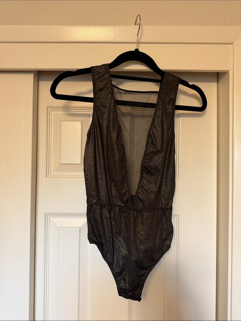 Victoria’s Secret Deep V Metallic Black & Gold Body Suit. XS.